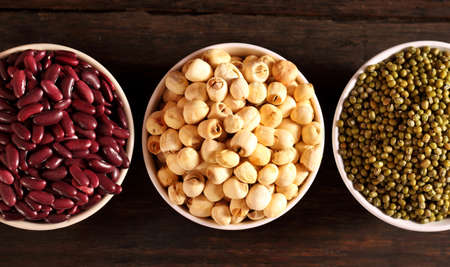 Lotus seeds, Red beans and green beans in white bowl on tableの写真素材
