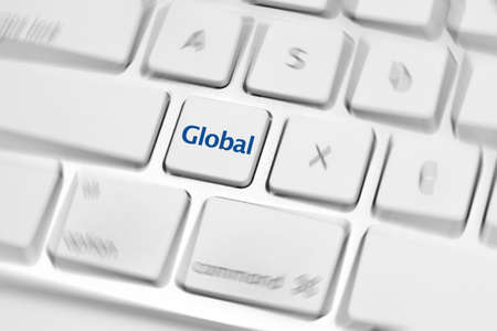 Social Media button on a keyboard showing the global iconの写真素材