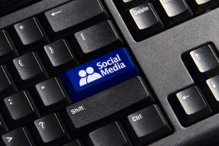 Social Media button on a keyboard showing the social media iconの写真素材