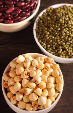 Lotus seeds, Red beans and green beans in white bowl on tableの写真素材