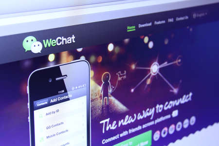 Johor, Malaysia - Dec 03, 2013: Photo of WeChat application webpage on a monitor screen. WeChat is a...
