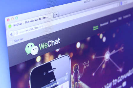 Johor, Malaysia - Dec 03, 2013: Photo of WeChat application webpage on a monitor screen. WeChat is a famous instant messaging application for smartphones, Dec 03, 2013 in Johor, Malaysia.のeditorial素材