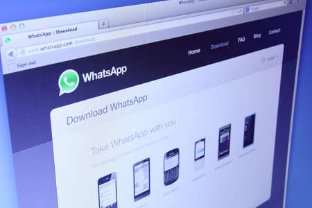 Johor, Malaysia - Dec 03, 2013: Photo of WhatsApp webpage on a monitor screen. WhatsApp Messenger is a famous instant messaging application for smartphones, Dec 03, 2013 in Johor, Malaysia.のeditorial素材