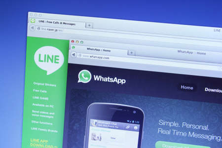 Johor, Malaysia - Dec 09, 2013: Photo of Line and WhatsApp on a monitor screen. They are famous instant messaging application for smartphones, Dec 09, 2013 in Johor, Malaysia.のeditorial素材