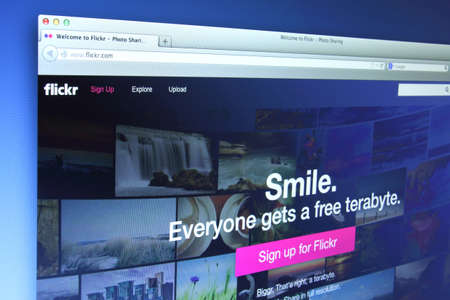 Johor, Malaysia - Dec 11, 2013: Flickr is a web-based photo management application which allows users to upload, organize, and share their favorite photos, Dec 11, 2013 in Johor, Malaysia.のeditorial素材