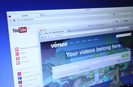 Johor, Malaysia - Dec 12, 2013: Photo of Youtube and Vimeo homepage on a monitor screen, They provides a platform for create, connect and discover the world's videos, Dec 12, 2013 in Johor, Malaysia.のeditorial素材