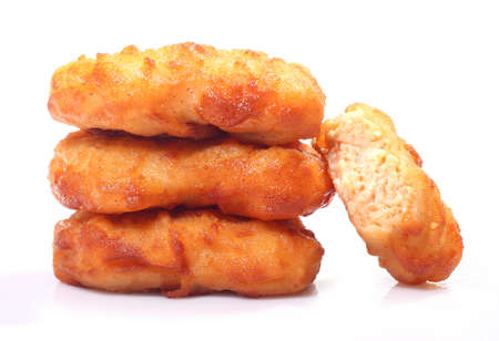 Crispy chicken nuggets isolated on white backgroundの写真素材