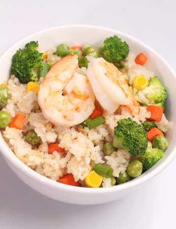 Homemade healthy fried rice isolated on white backgroundの写真素材