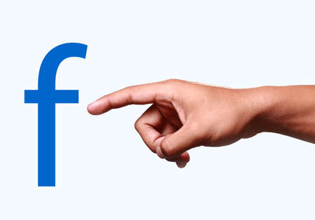 Index finger pointing at f icon.のeditorial素材