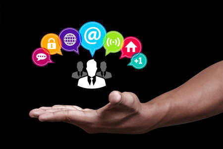 Hand showing the colorful internet iconの写真素材