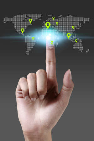 Hand pressing gps navigator icon on a virtual screen