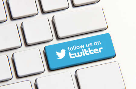 Johor, Malaysia - Jun 14, 2014: Follow us on Twitter icon on keyboard button, Twitter is a popular free social networking website in the world, Jun 14, 2014 in Johor, Malaysia.のeditorial素材