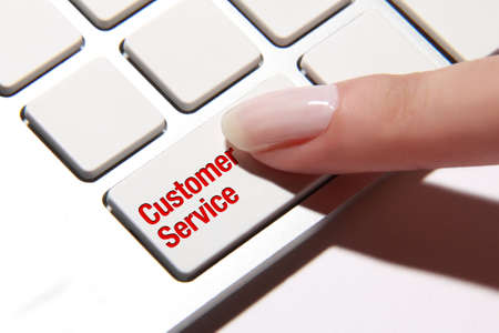 Hand press on customer service buttonの写真素材
