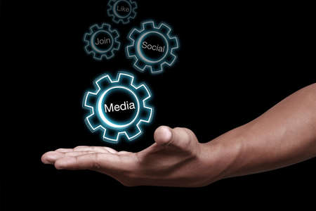 Hand showing social media icon