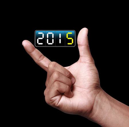 Hand showing Happy New Year 2015の写真素材
