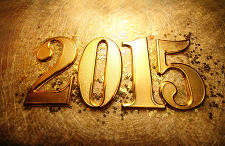 2014 gold numbers text on gold backgroundの写真素材