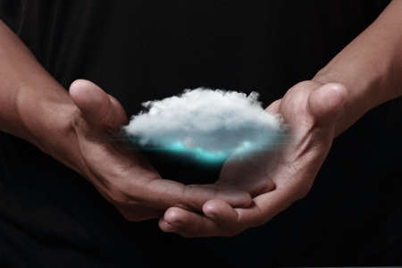 Cloud computing icon with handの写真素材