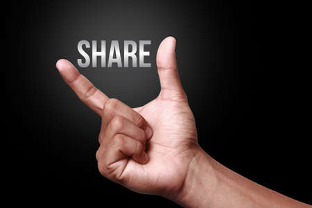 Hand showing a share iconの写真素材