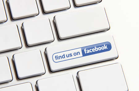 Johor, Malaysia - Jun 14, 2014: Find us on Facebook icon on keyboard button, Facebook is a popular free social networking website in the world, Jun 14, 2014 in Johor, Malaysia.のeditorial素材