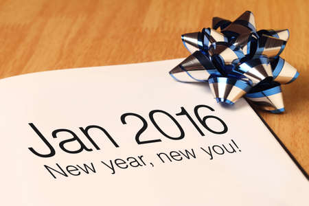 New year greetings with blue color decorations. New Year is the time at which a new calendar year begins and the calendar's year count increments by one.の写真素材