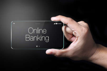 Online banking is an electronic payment system that enables customers of a financial institution to conduct financial transactions on a website.の写真素材
