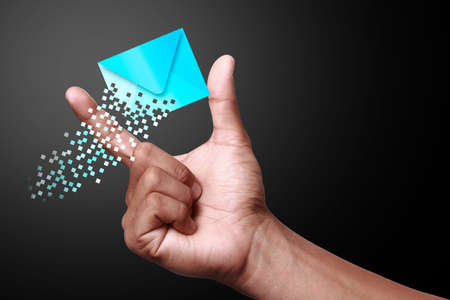 Hand showing message icons. A message is a short communication sent from one person to another or...