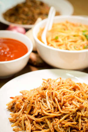 Fried noodles are delicious and healthy dish, quick and easy to make. Chinese people usually add plenty of salt and soy sauce for extra flavor.の写真素材