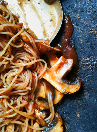 Spaghetti is a long, thin, cylindrical, solid pasta. It is a staple food of traditional Italian cuisine.の写真素材