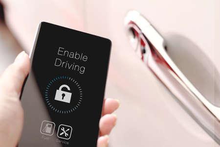 Hand showing smart start icon on smartphone. Smartphone has made our lives easier.