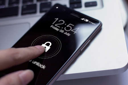 Slide to unlock icon on smarphone. Locking your smartphone will help keep you and your information protected.の写真素材