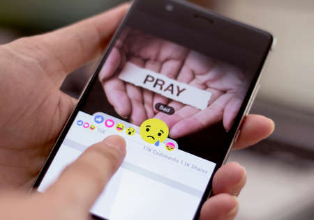 Johor, Malaysia - Feb 13, 2017: Facebook users show range of reactions to new love, haha, wow, sad, angry emoticons, Jul 1, 2015 in Johor, Malaysia.のeditorial素材