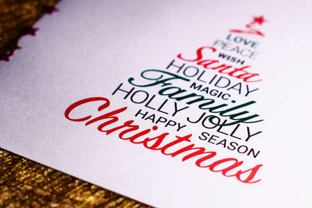 Colorful Christmas card on gold background. Wishing you wonderful memories during this joyous season.の写真素材