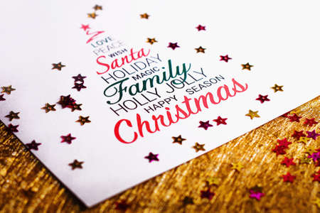 Colorful Christmas card on gold background. Wishing you wonderful memories during this joyous season.の写真素材