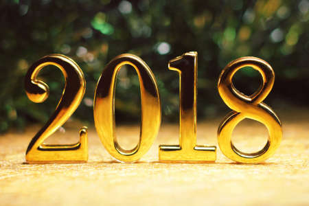 2018 gold numbers text and decoration. New year is the first day of the year in the Gregorian...