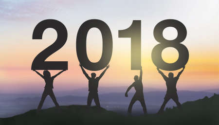 Silhouette people happy for 2018 new year. We wish you a new year filled with wonder, peace, and meaning.の写真素材