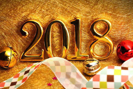 2018 gold numbers text and decoration. New year is the first day of the year in the Gregorian...