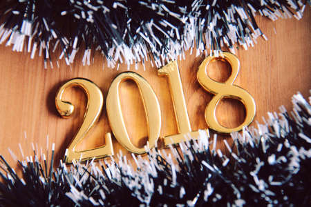 2018 gold numbers text and christmas tree decoration. New year is the first day of the year in the Gregorian calendar.の写真素材