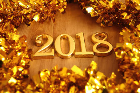 2018 gold numbers text and decoration. New year is the first day of the year in the Gregorian...