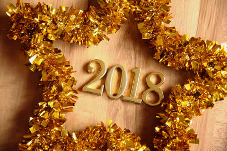 2018 gold numbers text and decoration. New year is the first day of the year in the Gregorian...