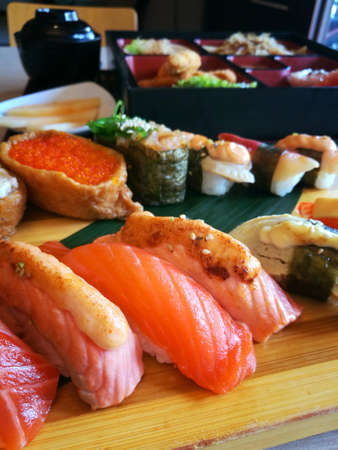 Sushi dish at japanese restaurant. Sushi is the most famous dishes in the Japanese cuisine.の写真素材