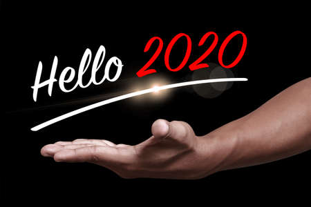 Hello 2020 with hand. New year is the first day of the year in the Gregorian calendar.の写真素材