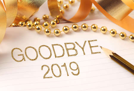 Goodbye 2019 with gold decoration. New year is the first day of the year in the Gregorian calendar.の写真素材