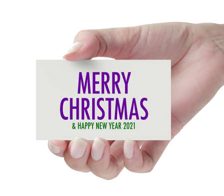 Hand showing Merry Christmas & Happy New Year. Wishing you wonderful memories during this joyous season.の写真素材