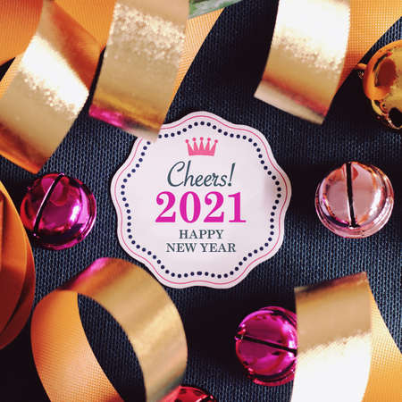 Cheers new year 2021 with decoration. We wish you a new year filled with wonder, peace, and meaning.の写真素材