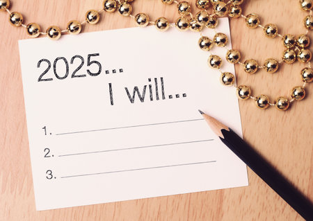 2025 to do list with gold decoration. We wish you a new year filled with wonder, peace, and meaning.の写真素材
