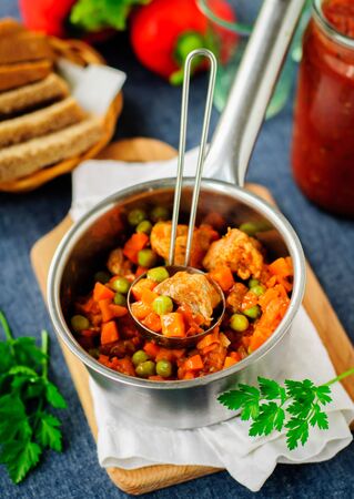 Pork Ragout (Stew) with Carrots and Green Peasの写真素材