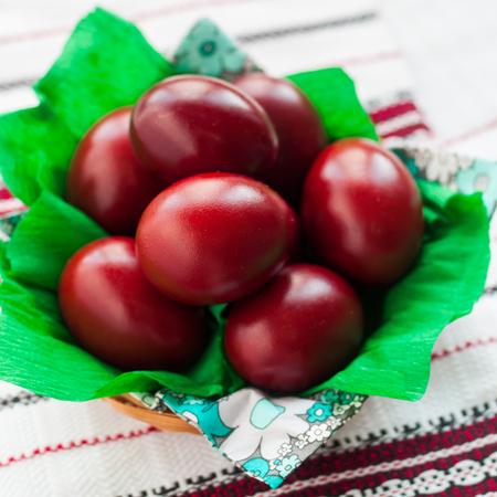 Easter Red Onion Dyed Eggs on a Traditional Towel, square
