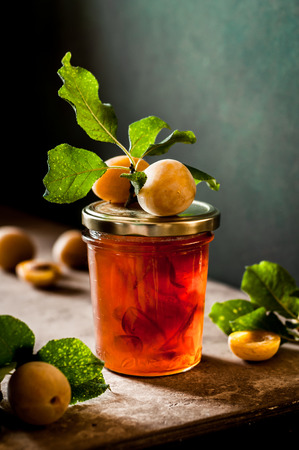Yellow Plum Jam in a Jar, Backlight, copy space for your textの写真素材