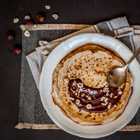 Thin Crepes with Chocolate Spread and Hazelnuts, squareの写真素材
