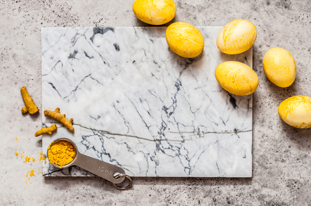 Turmeric Dyed Easter Eggs, copy space for your textの写真素材